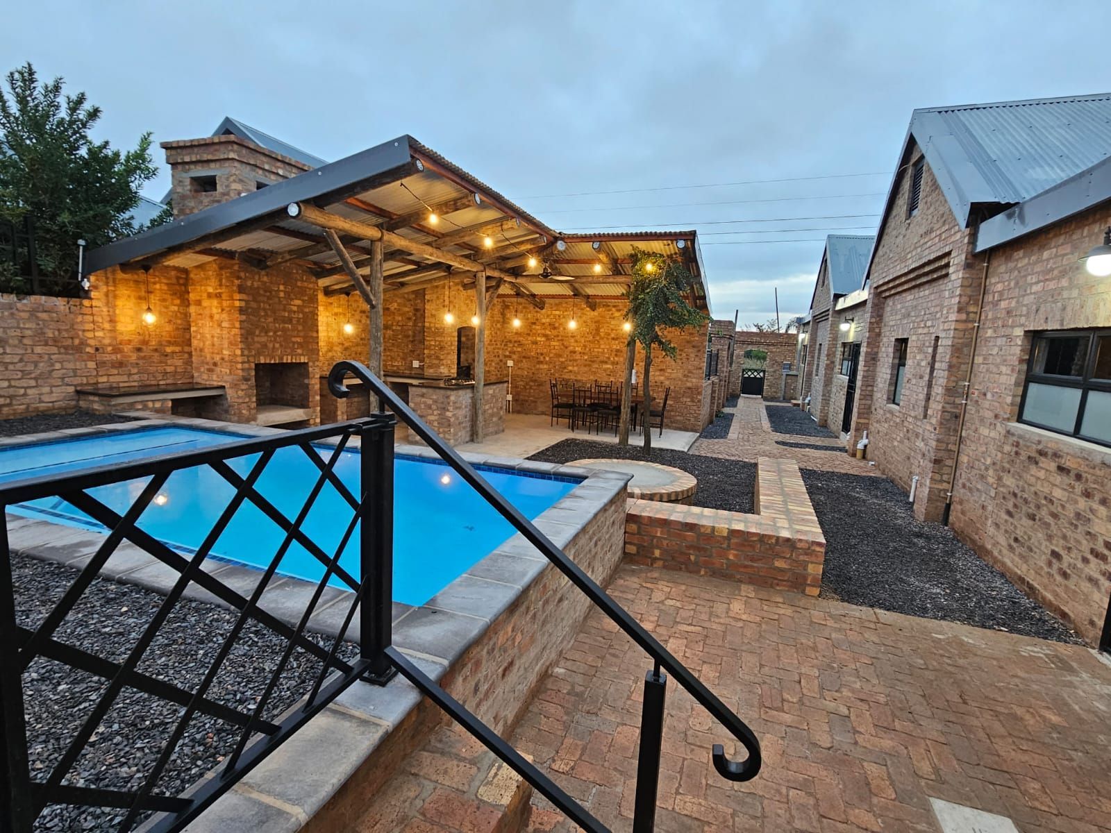 The swimming pool near the sleek and modern new cottages at Riverside Castle in Pretoria.