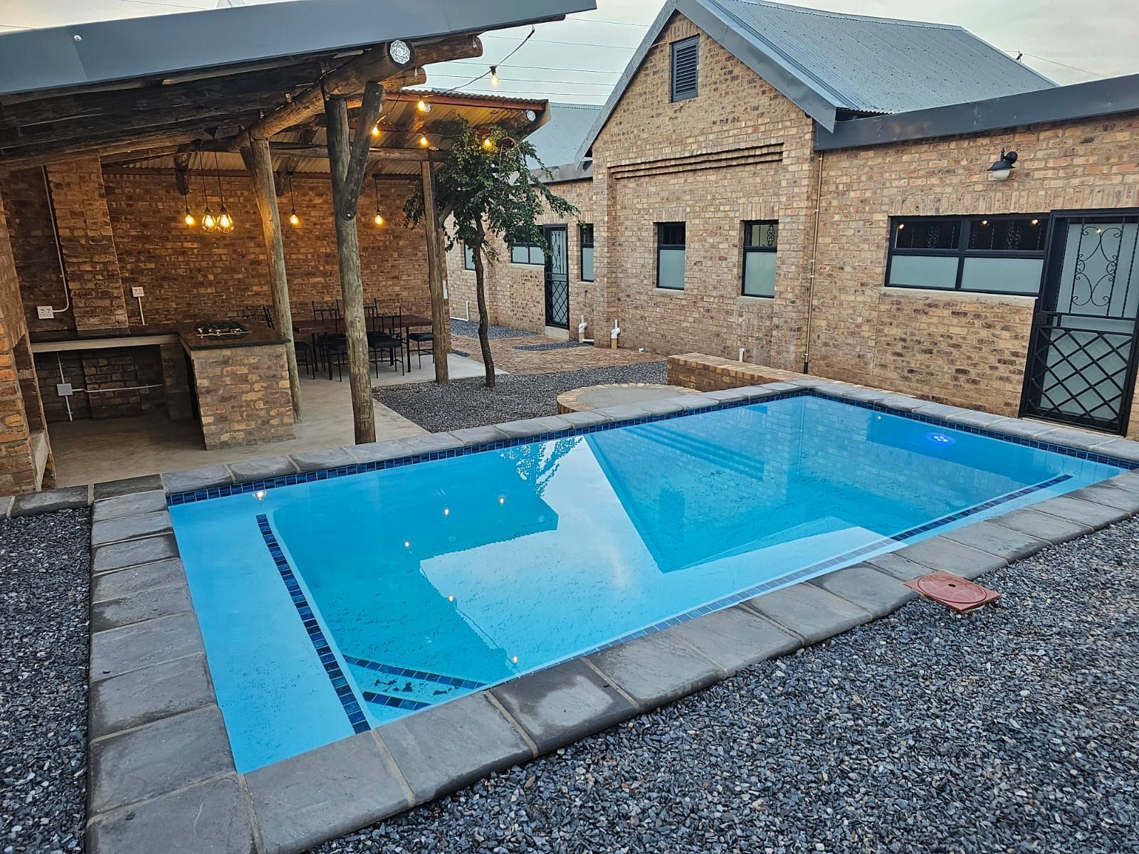 The swimming pool near the sleek and modern new cottages at Riverside Castle in Pretoria.