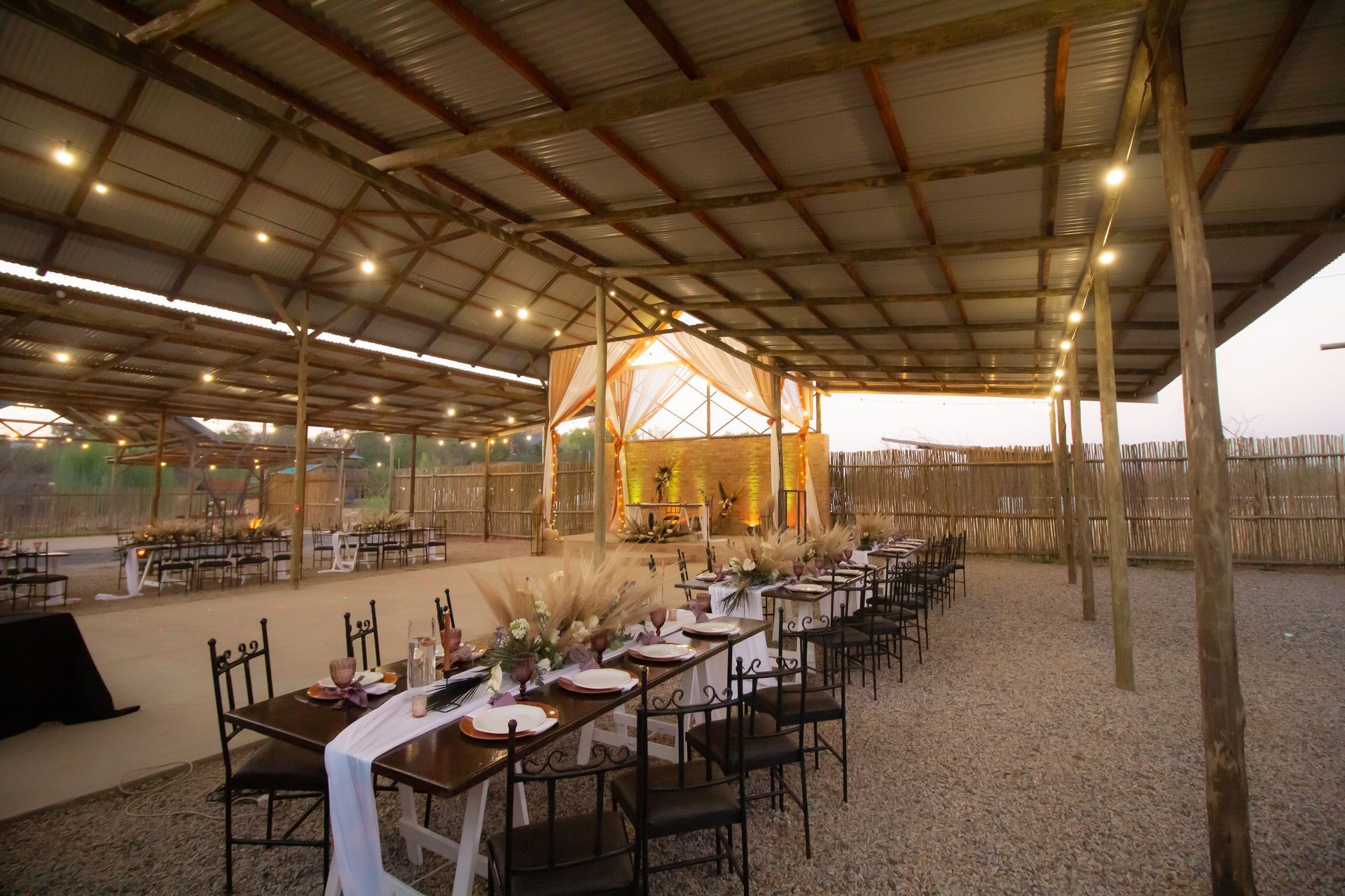 Tables prepared for a lavish event in the Piazza at Riverside Castle, Pretoria East's major event venue.