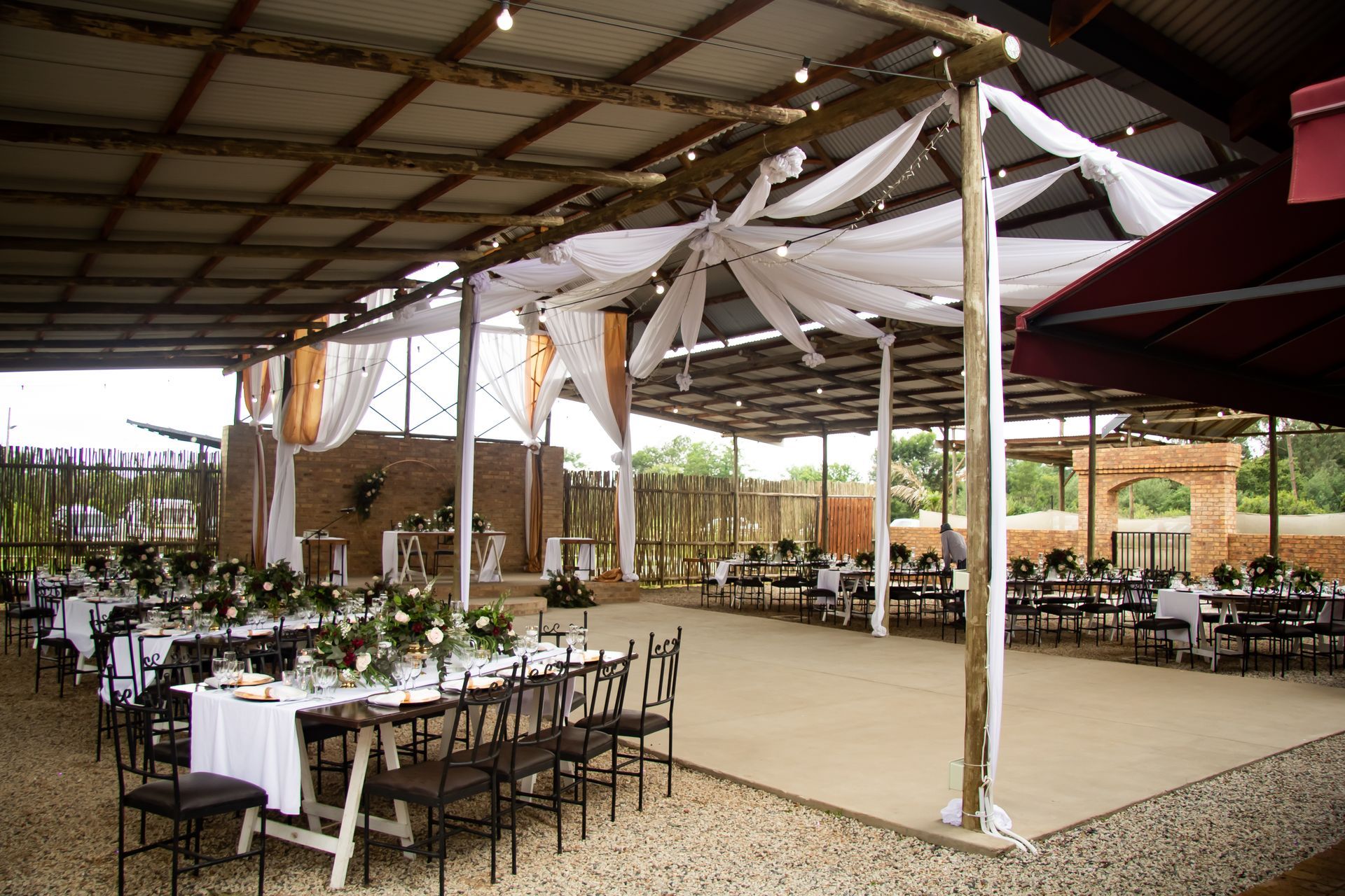 Tables prepared for a lavish event in the Piazza at Riverside Castle, Pretoria East's major event venue.