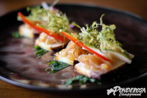 A close up of a plate of food that says ponderosa campground