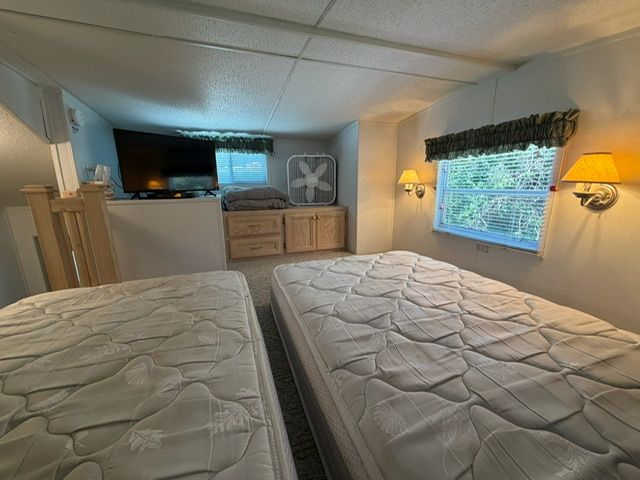 2003 Kroft Park Model bedroom with TV