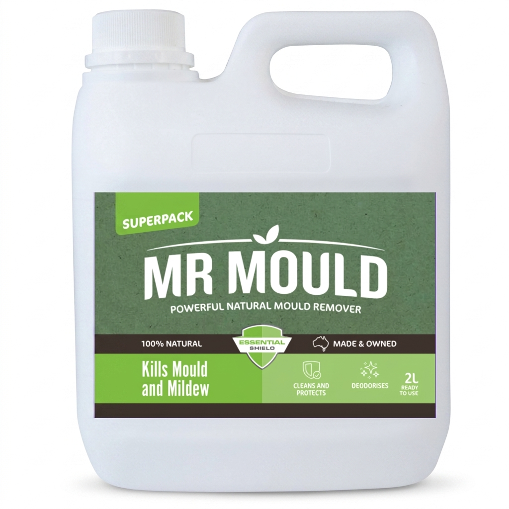 White Mr Mould cleaning liquid bottle with green label on a wooden surface, beside a cloth and eucalyptus leaves