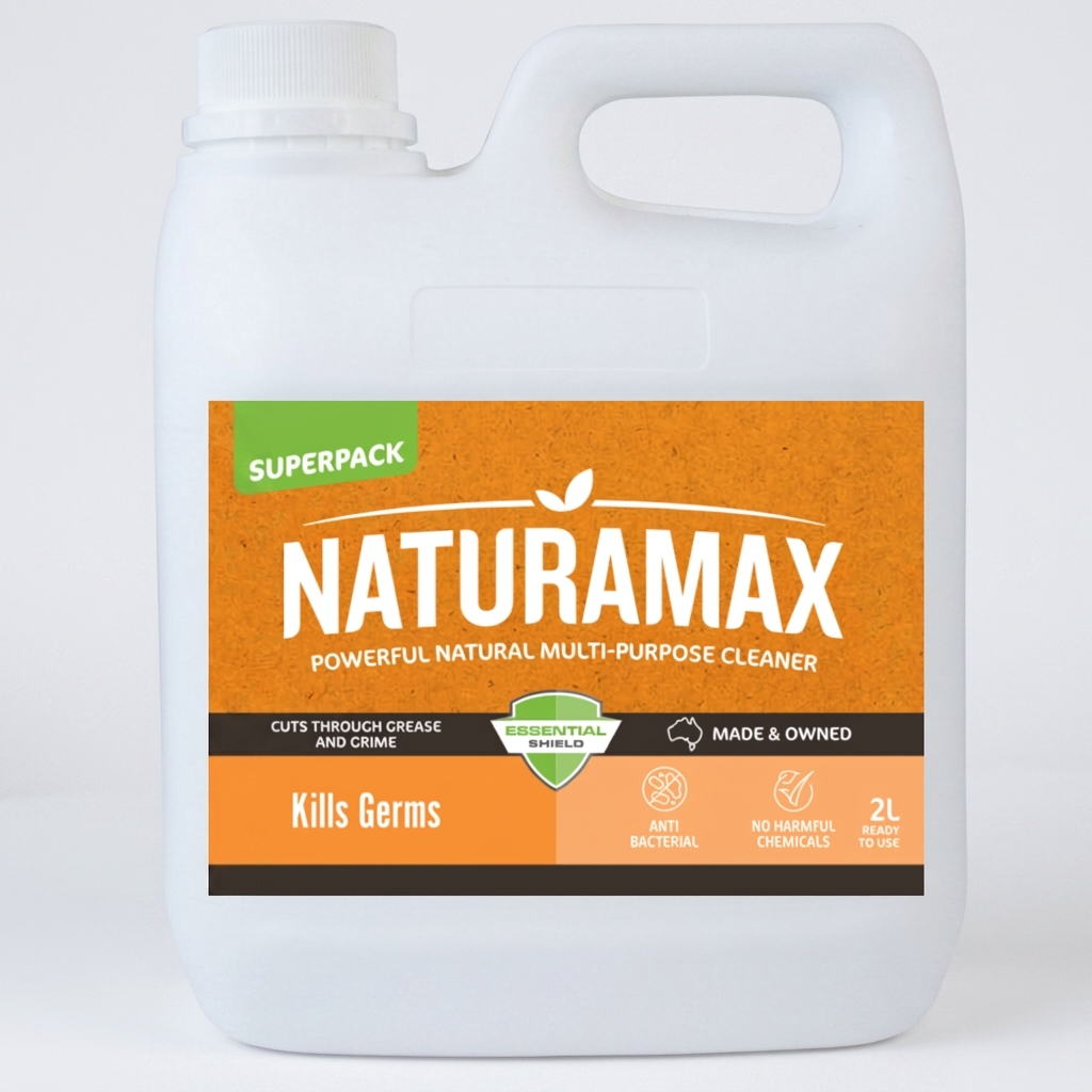 Naturamax cleaning product jug on a kitchen countertop beside a folded cloth