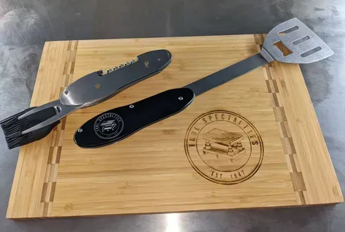 Logo engraved in cutting board.