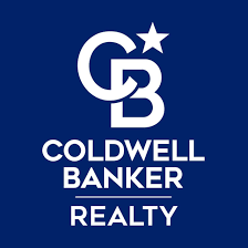 The logo for coldwell banker realty is on a blue background.