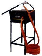 A hose is attached to a microphone on a stand.