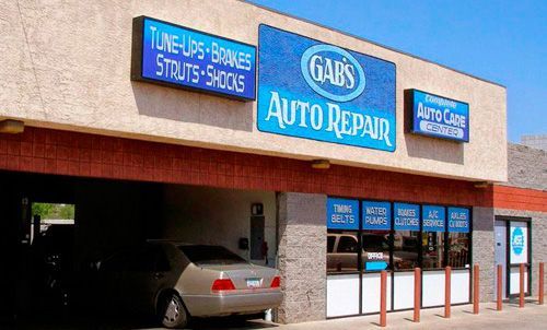 A car is parked in front of gabs auto repair