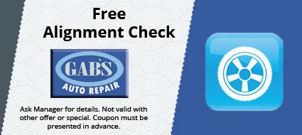 Free alignment check ad with GABS Auto Repair logo and blue wheel icon on blue background