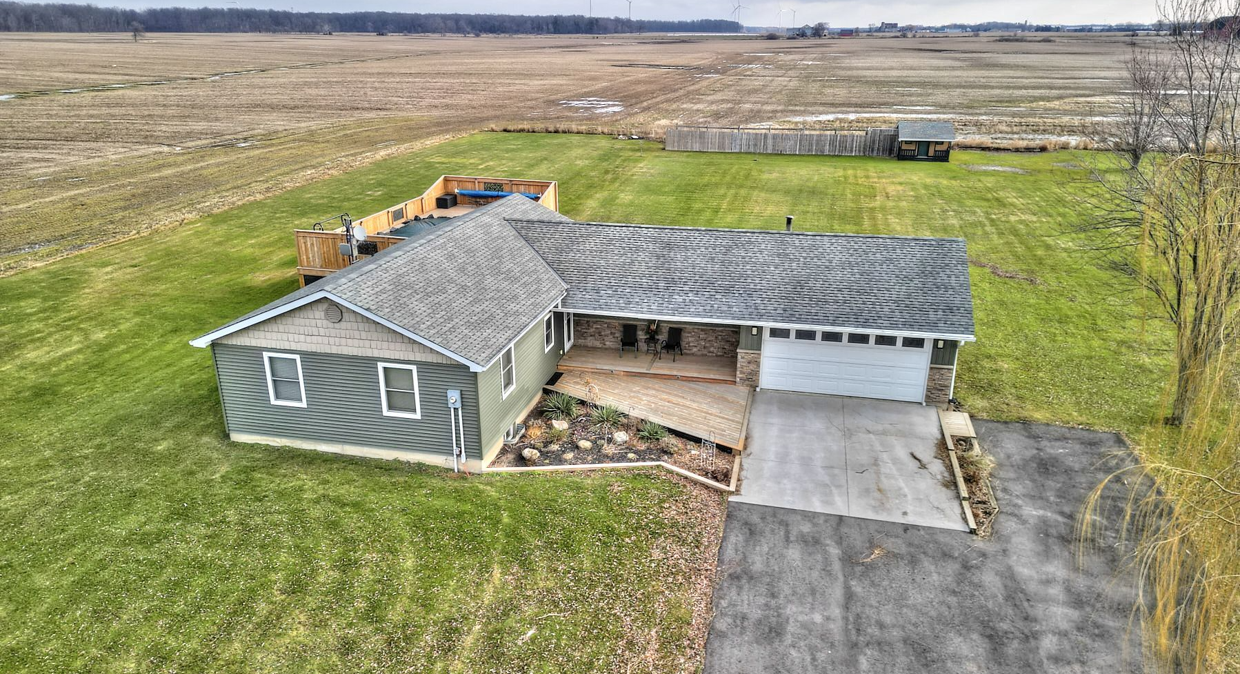 A picture showcasing the comfort and elegance of a residential dwelling in the country with over one acre of land.