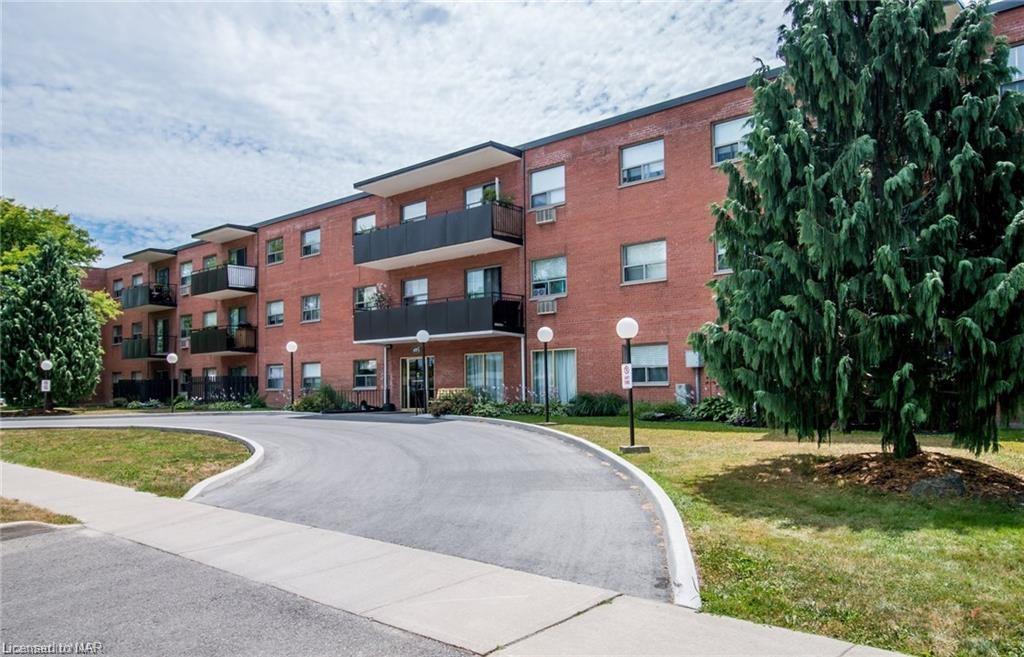 A picture of a charming condominium building.