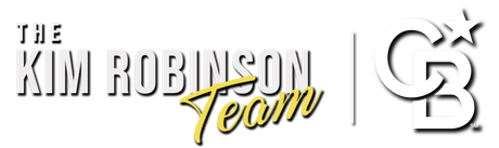 The Kim Robinson Team's real estate logo is in bold and italic yellow and white text.