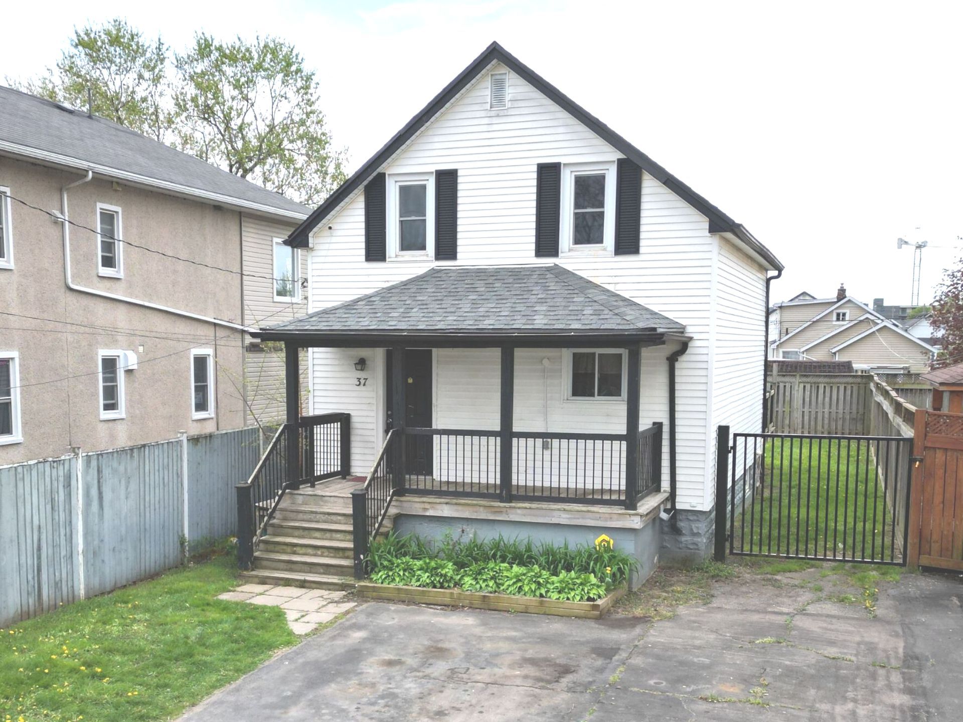 A great starter home with three bedrooms, one bathroom, loads of parking, and a fully fenced 132-foot deep lot.