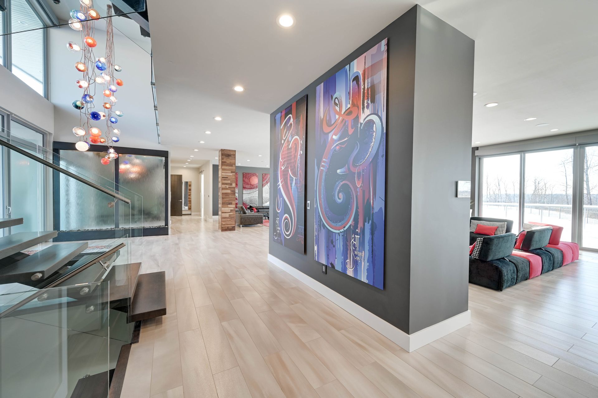 A living room with a large painting on the wall