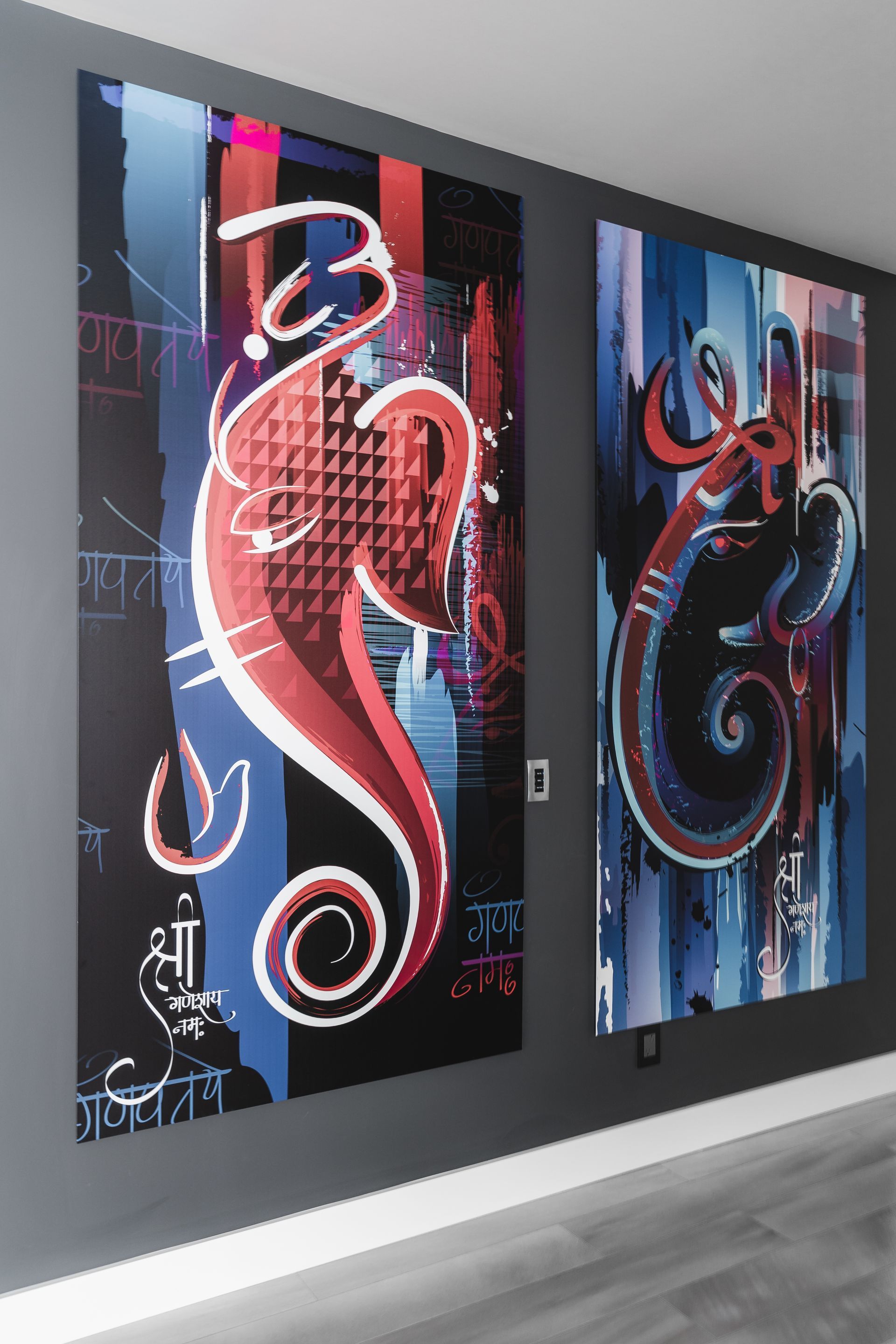 Two paintings of a seahorse are hanging on a wall