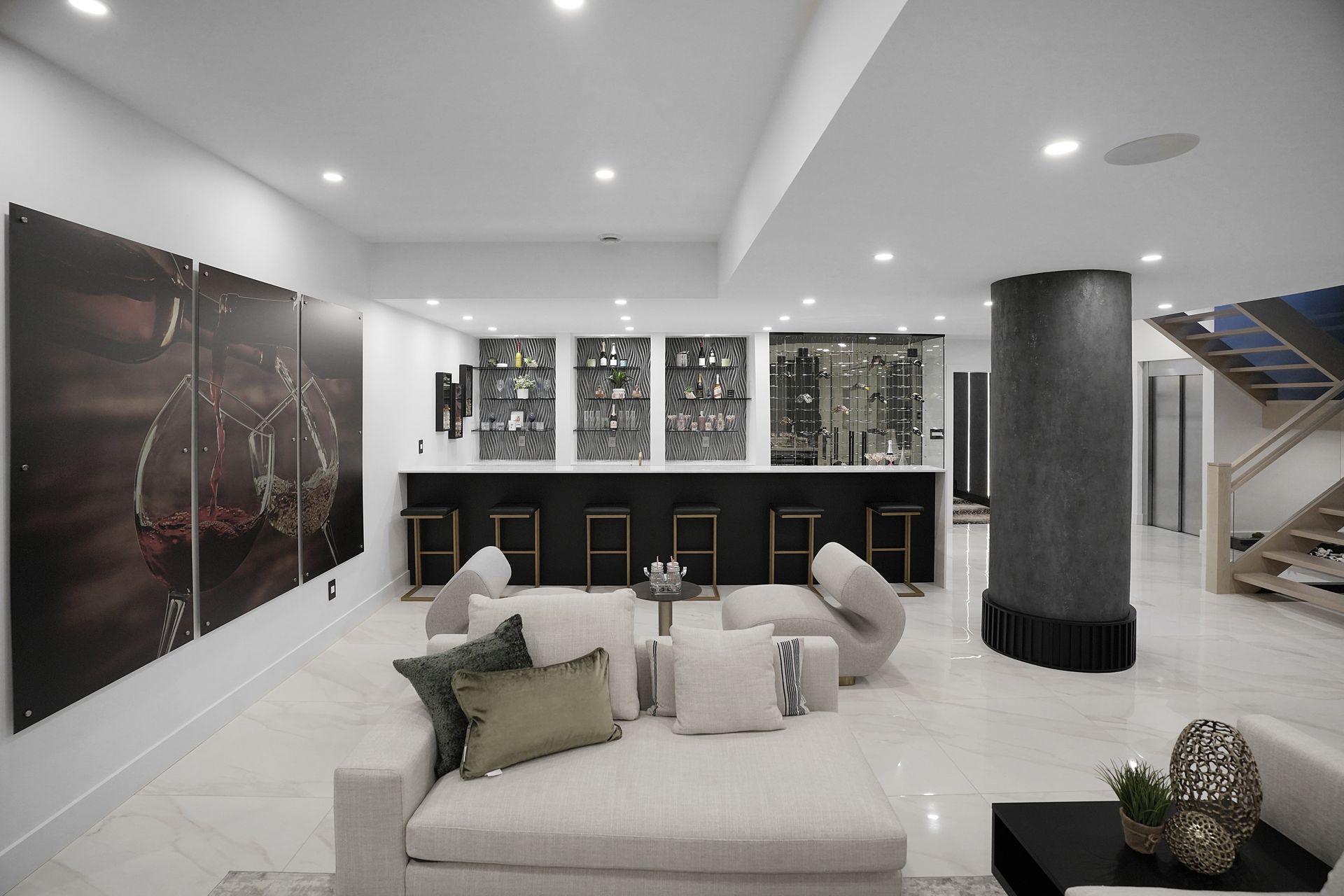 A living room with a couch and a bar in it