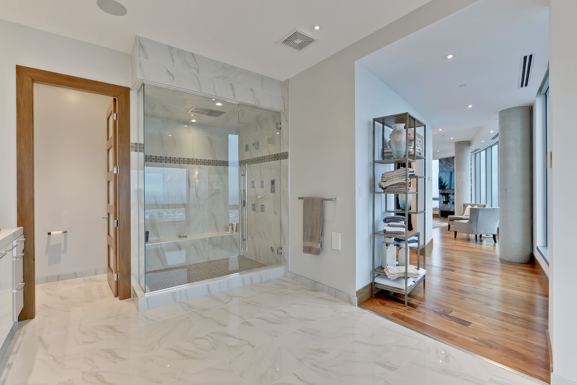 A bathroom with a walk in shower and a bathtub