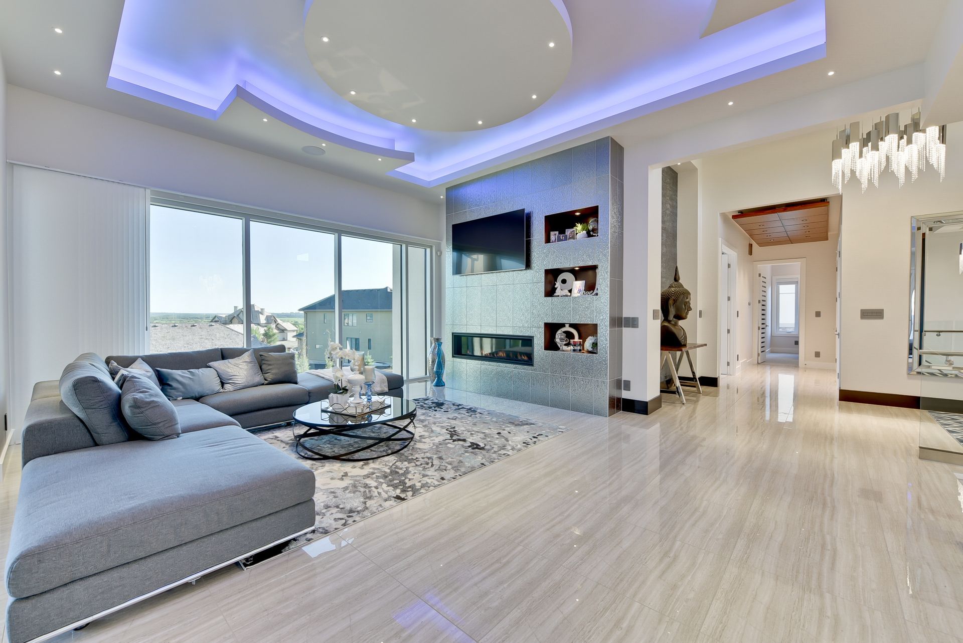 A living room with a couch and a fireplace