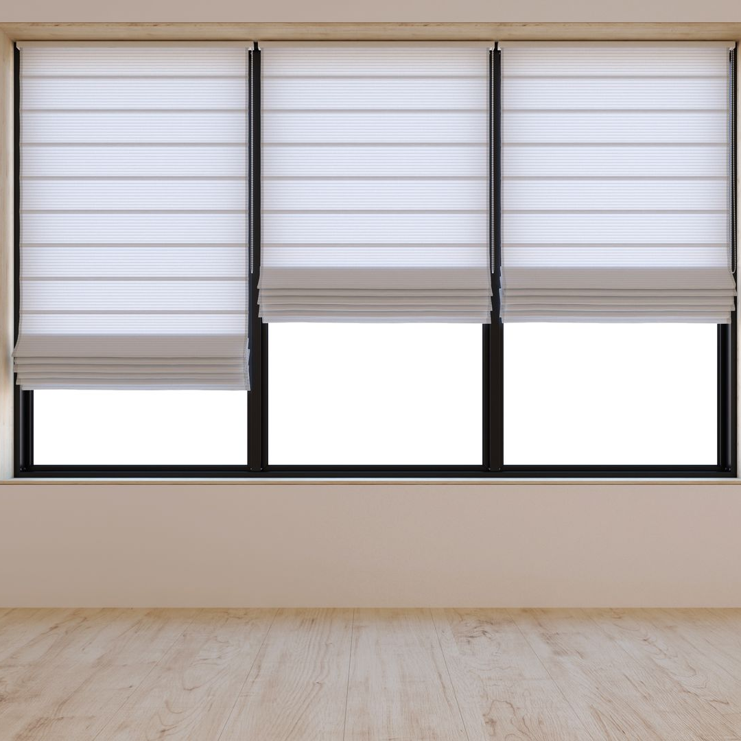 Three white roman shades partially covering windows in a room with light wood floors and beige walls.
