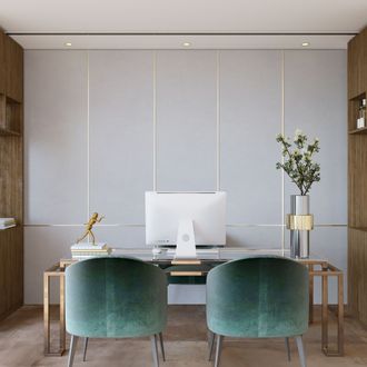 A home office with two green chairs and a desk with a computer on it