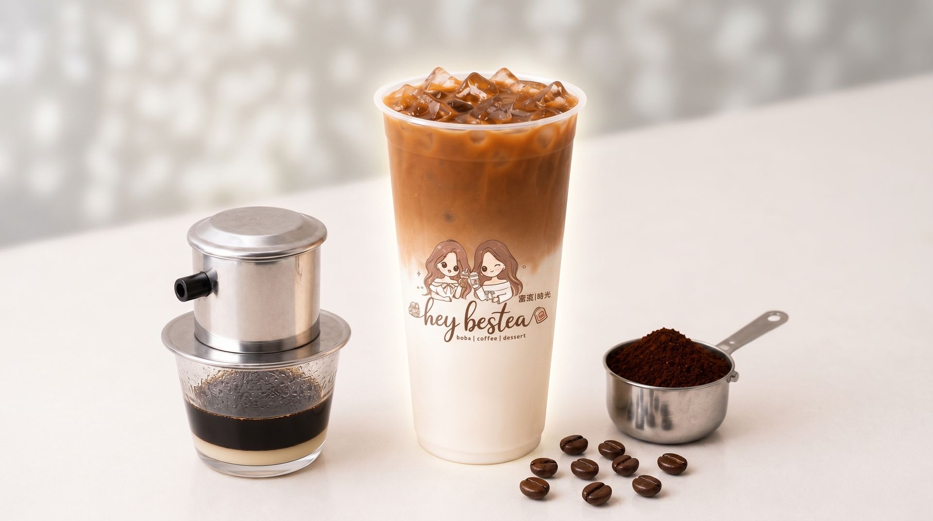 Coffee and iced latte with a French press, spoon, and coffee beans on a white table.