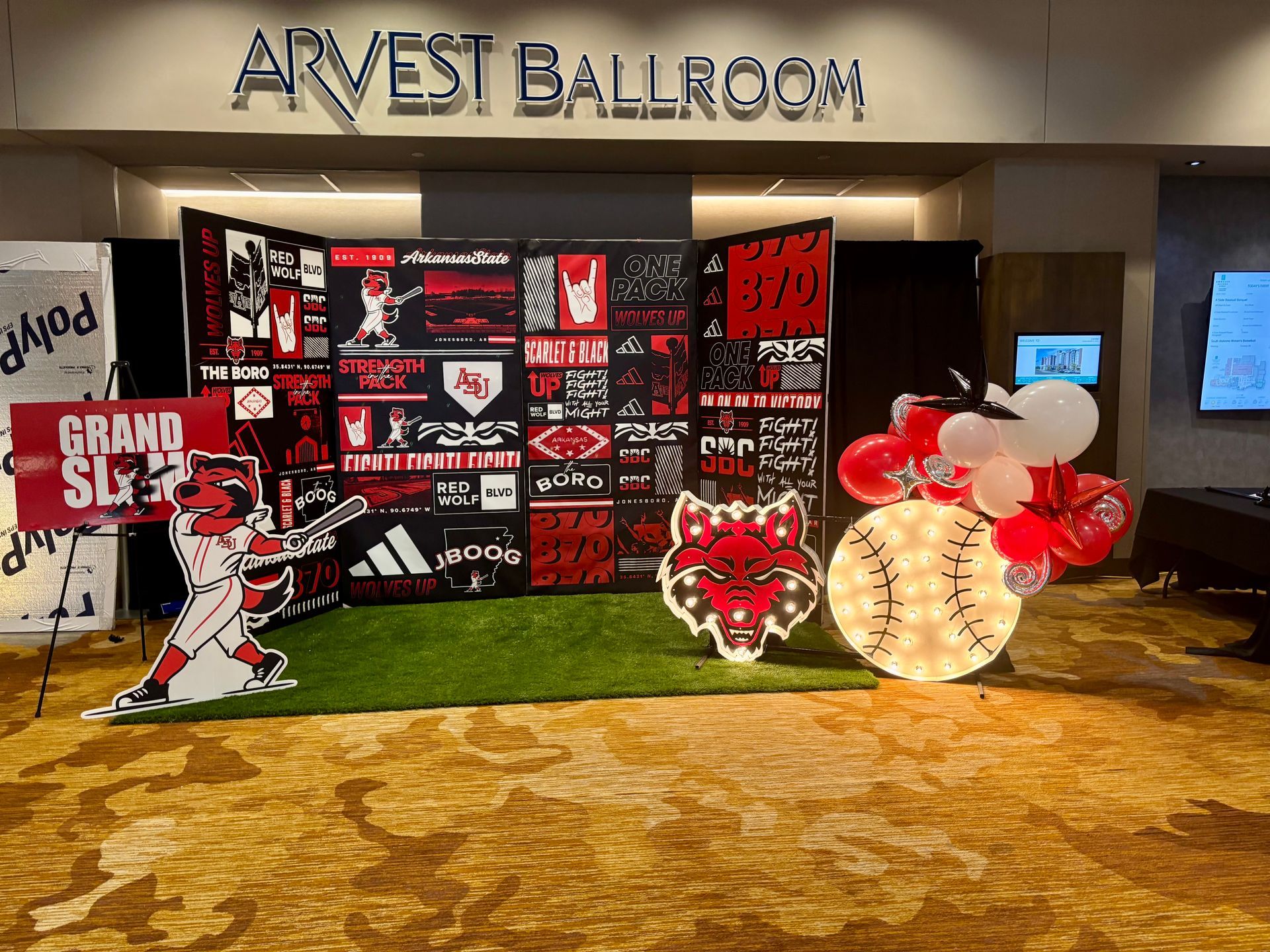 arkansas state baseball booth with balloon decor