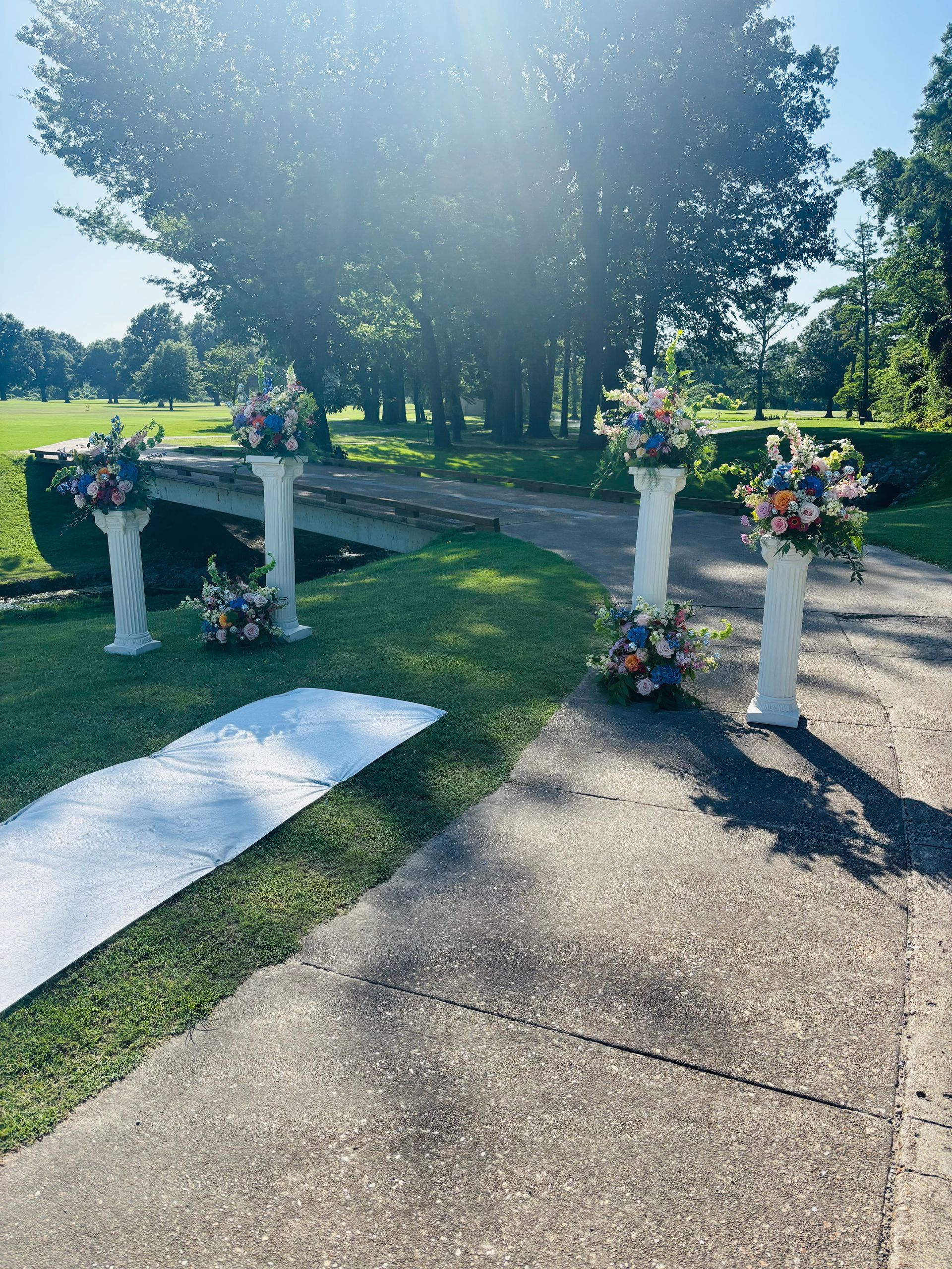 colorful wedding flowers on columns