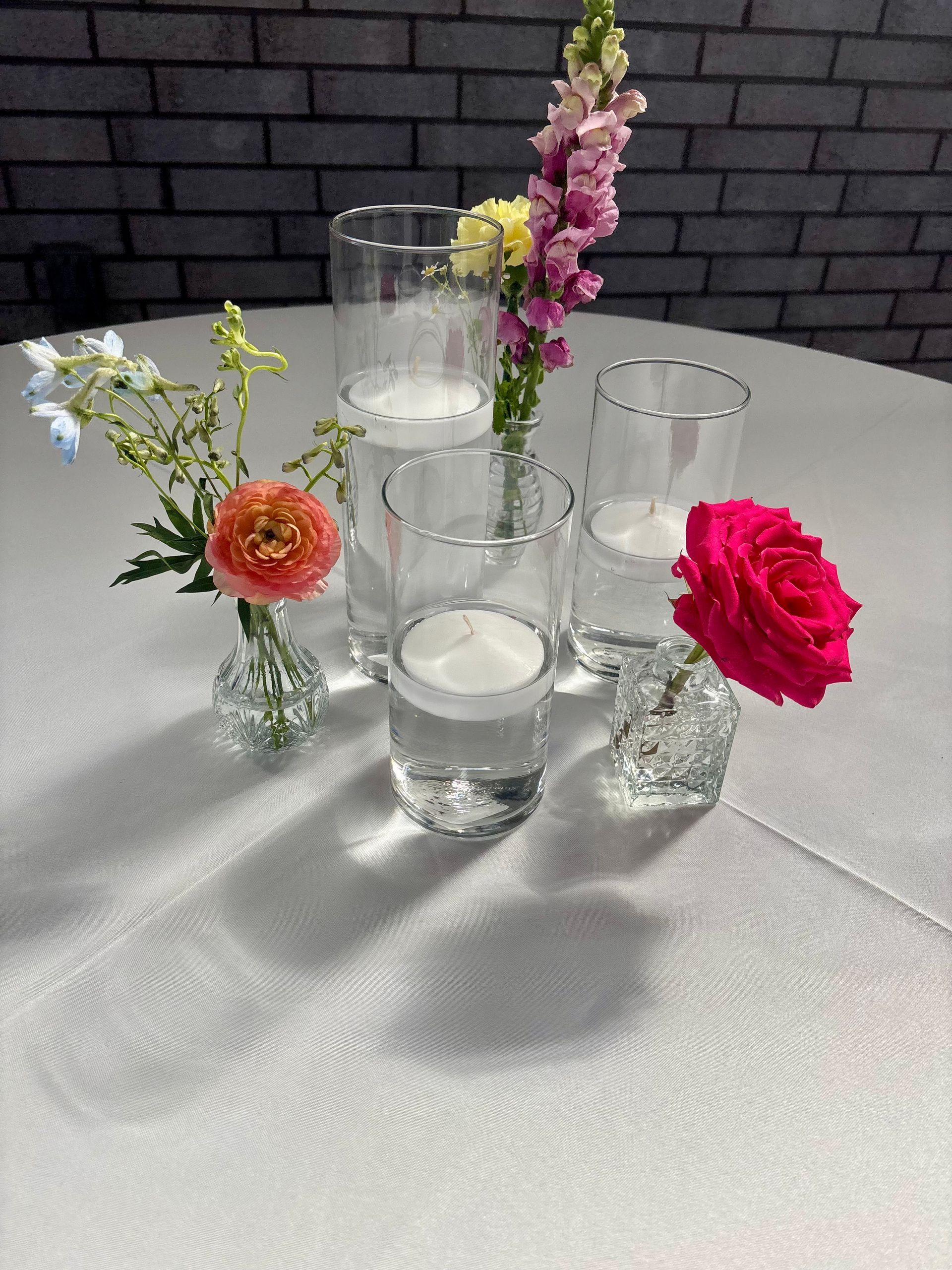 minimalist floral centerpiece with floating candles