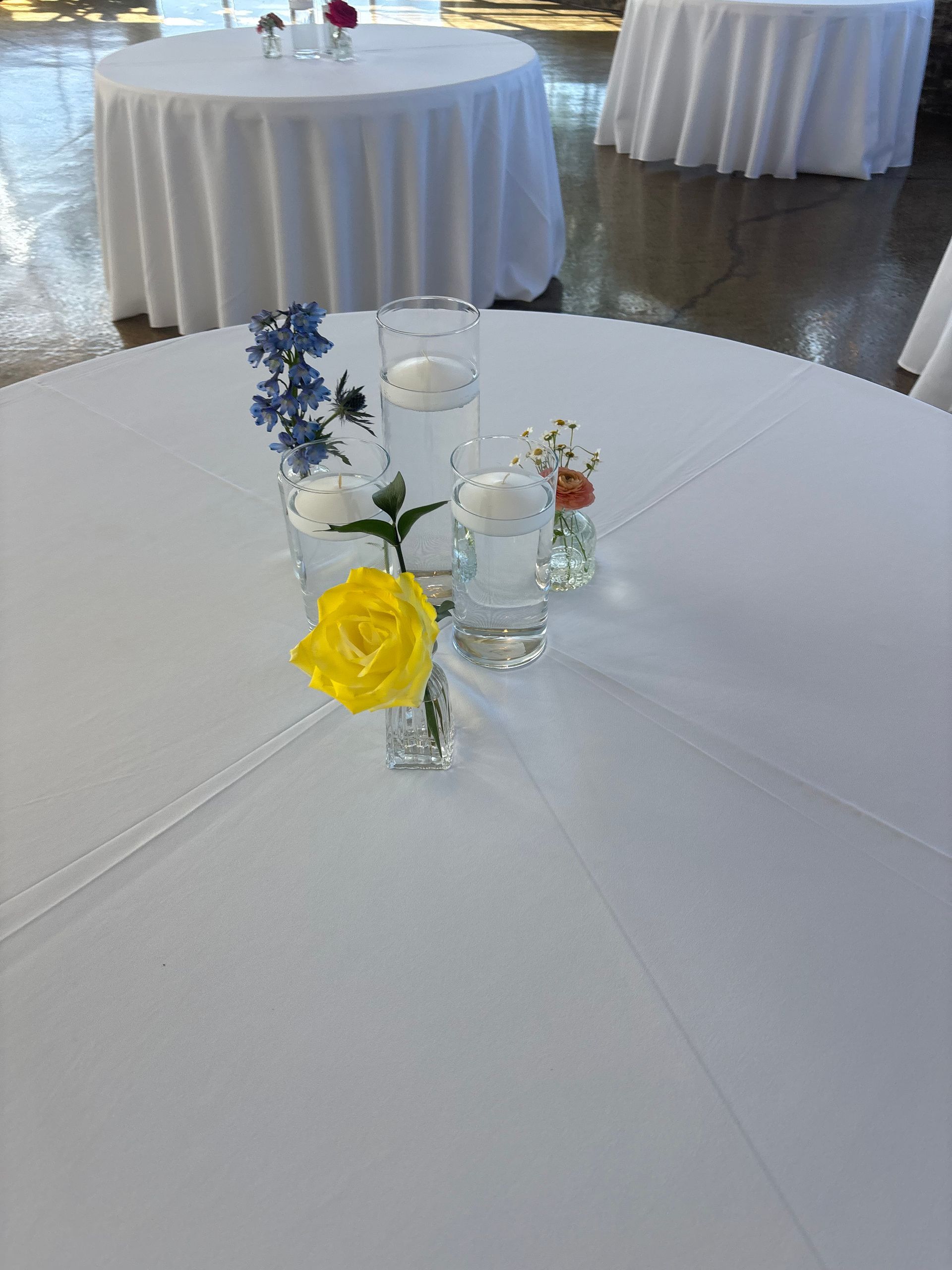 minimalist floral centerpiece with floating candles