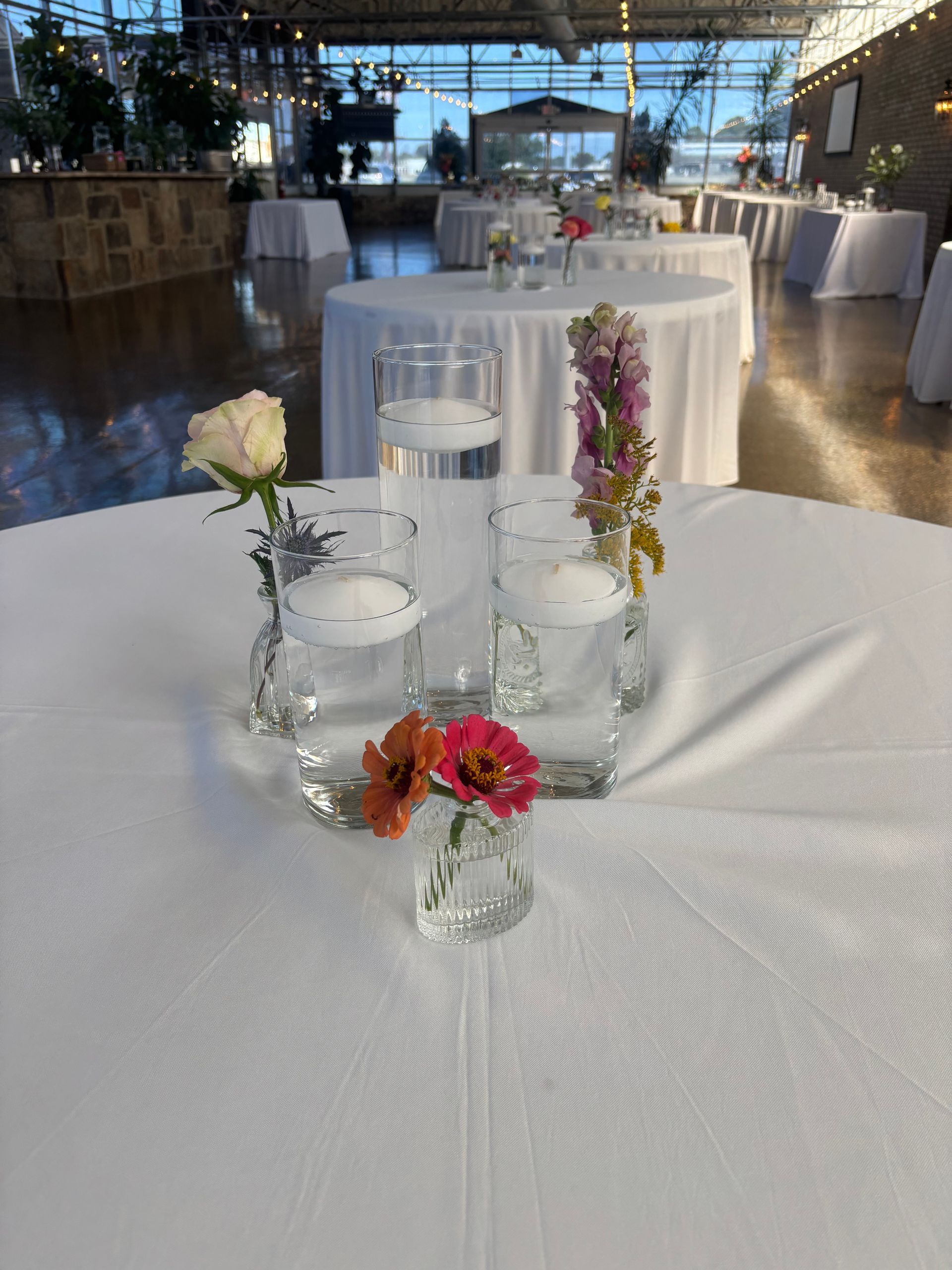 minimalist floral centerpiece with floating candles