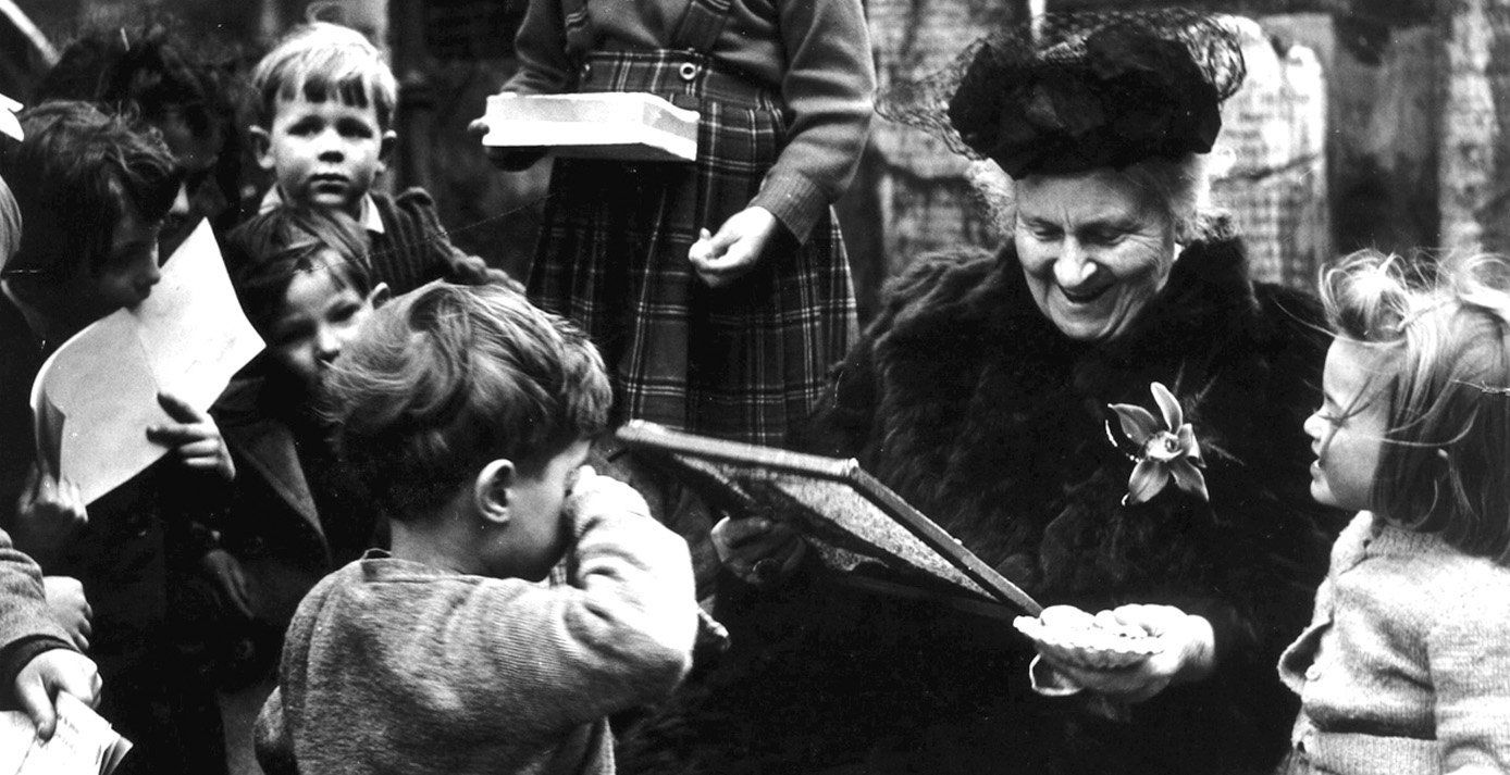Dr. Maria Montessori with children
