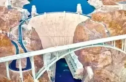 Henderson Artificial Turf-complements the durability seen in this image of Hoover Dam and the Memorial Bridge. Rugged cliffs and a blue reservoir complete the scenes.