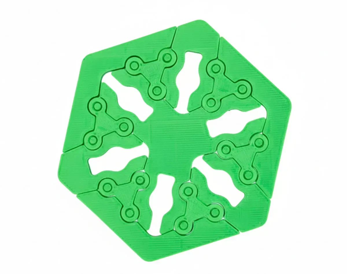 Green hexagonal geometric pattern with cutout shapes and circular nodes