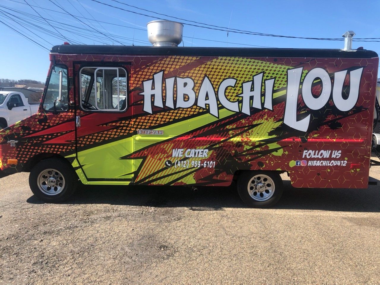 Hibachi Lou food truck, red, yellow, and black graphics. 