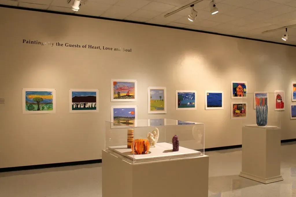 A museum filled with lots of paintings and sculptures