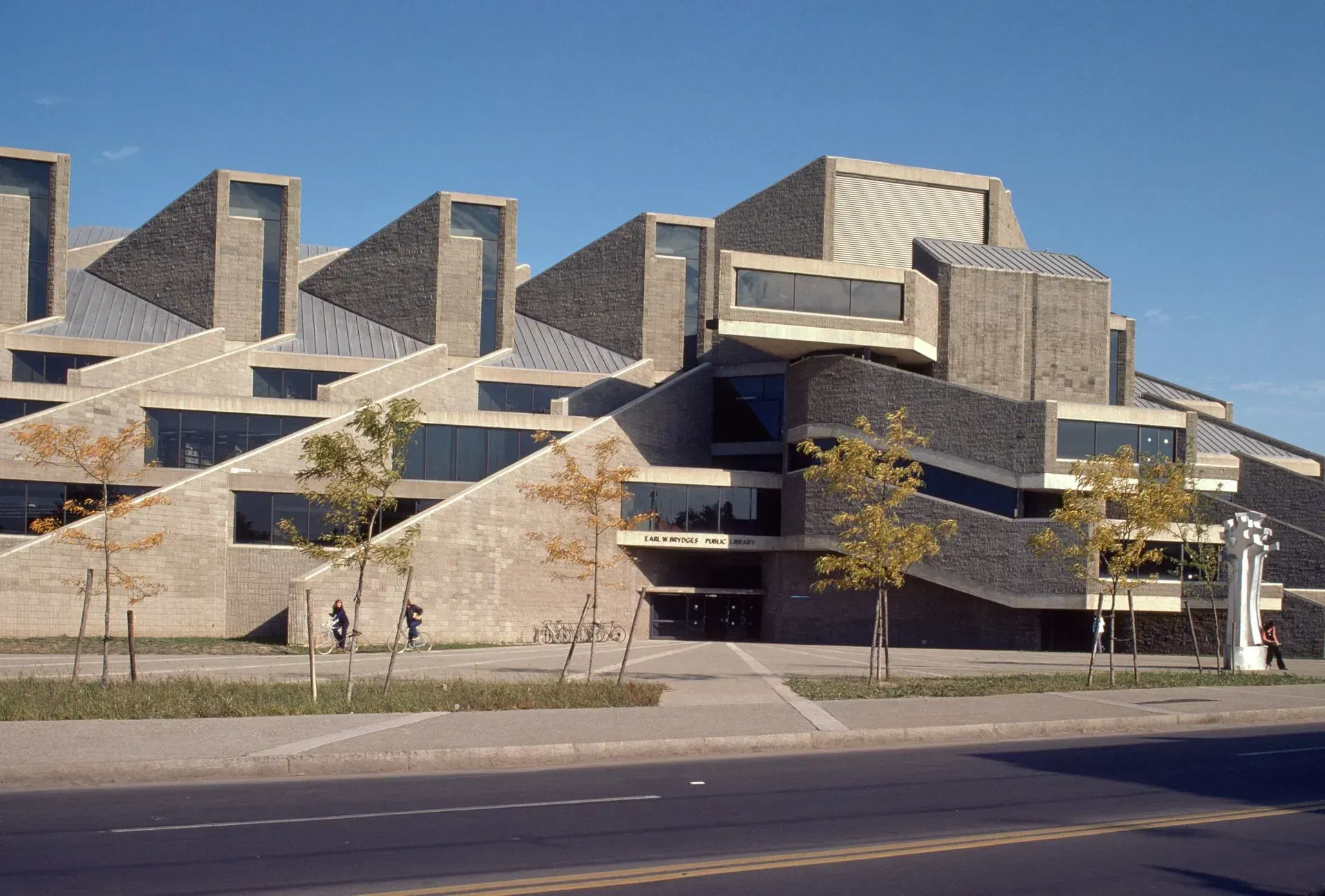 A large building with a lot of windows and stairs