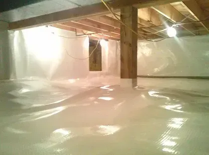 A basement filled with plastic and wooden beams.