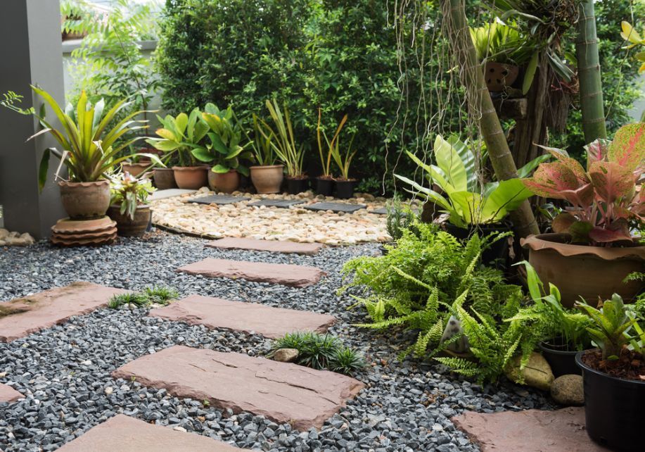 A Garden With Lots Of Potted Plants And Rocks — Twin Towns Sand & Gravel In Tweed Heads South, NSW