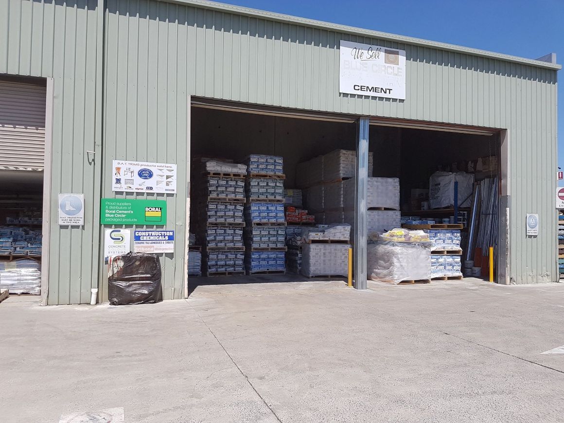 A Large Warehouse With Lots Of Boxes Stacked On Top Of Each Other — Twin Towns Sand & Gravel In Tweed Heads South, NSW