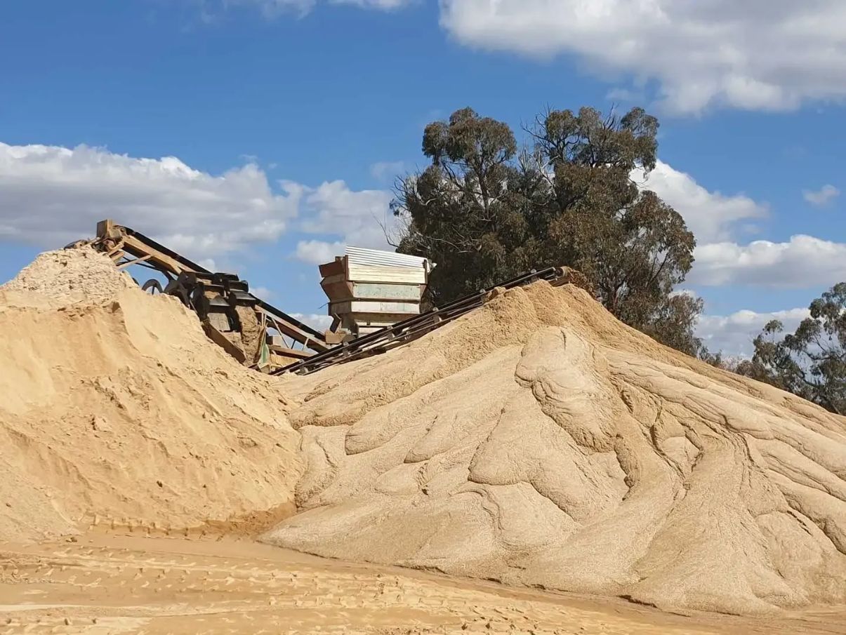 A Large Pile Of Sand With Trees In The Background — Twin Towns Sand & Gravel In Tweed Heads South, NSW