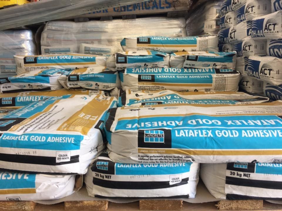 Many Bags Of Lataflex Gold Adhesive Are Stacked On Top Of Each Other — Twin Towns Sand & Gravel In Tweed Heads South, NSW