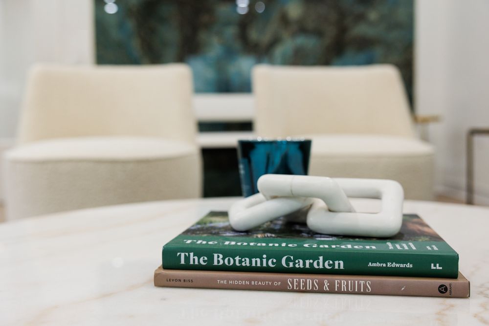 A stack of books sitting on top of each other on a table.