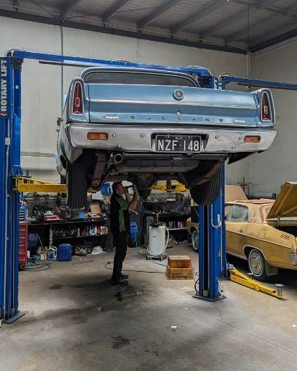 A Car on a Lift — High Grade Tyre and Mechanical in Toowoomba City, QLD