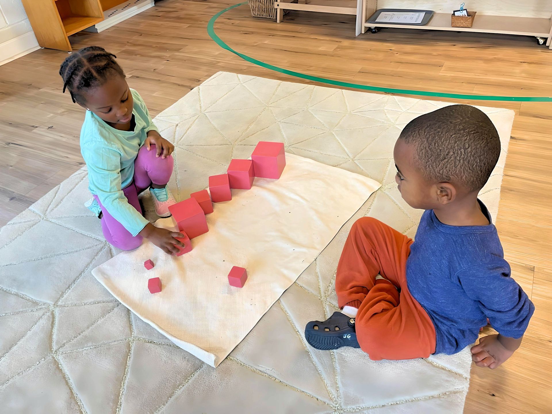 Montessori child playing outside