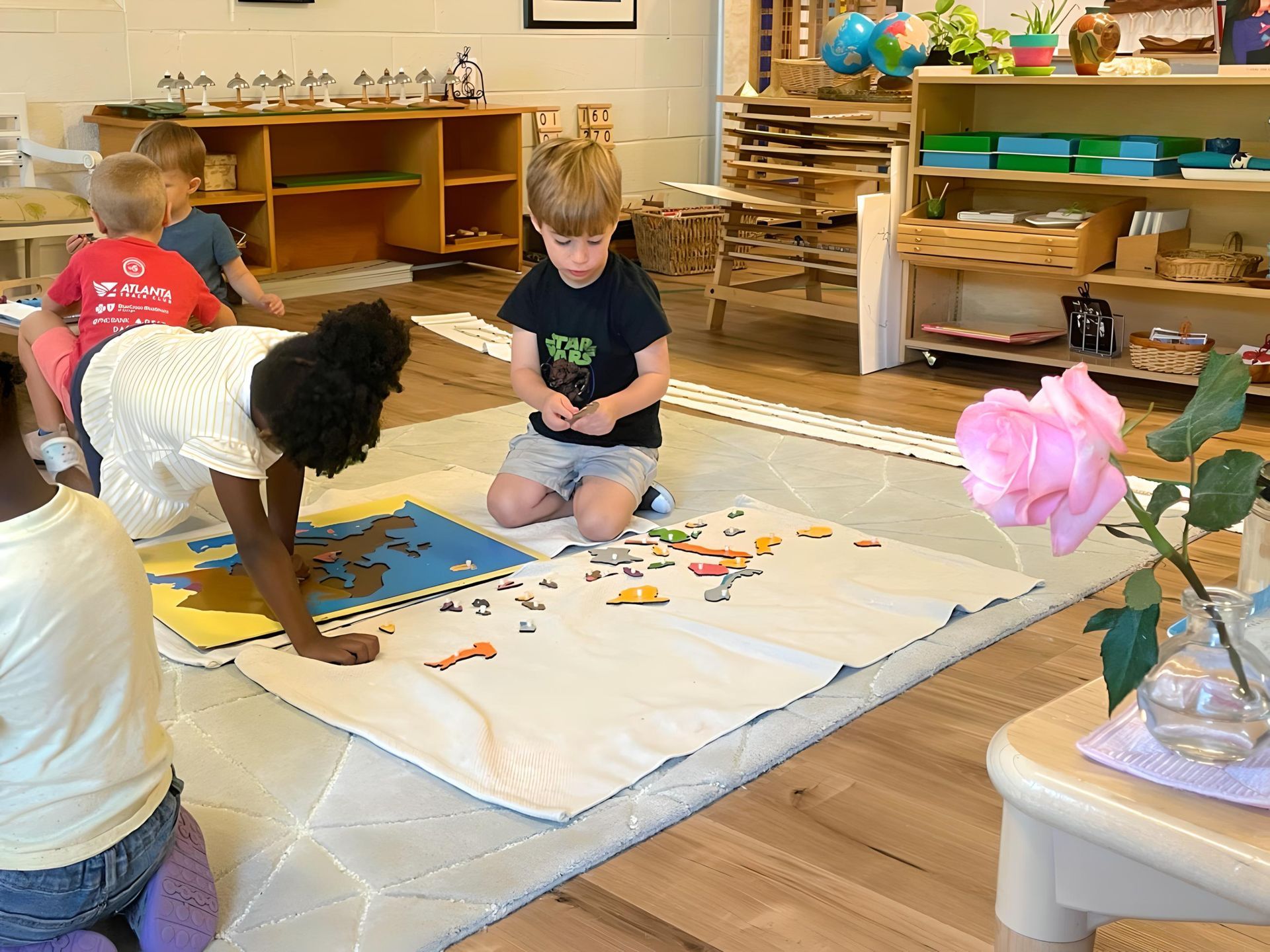 Montessori children working in the classroom