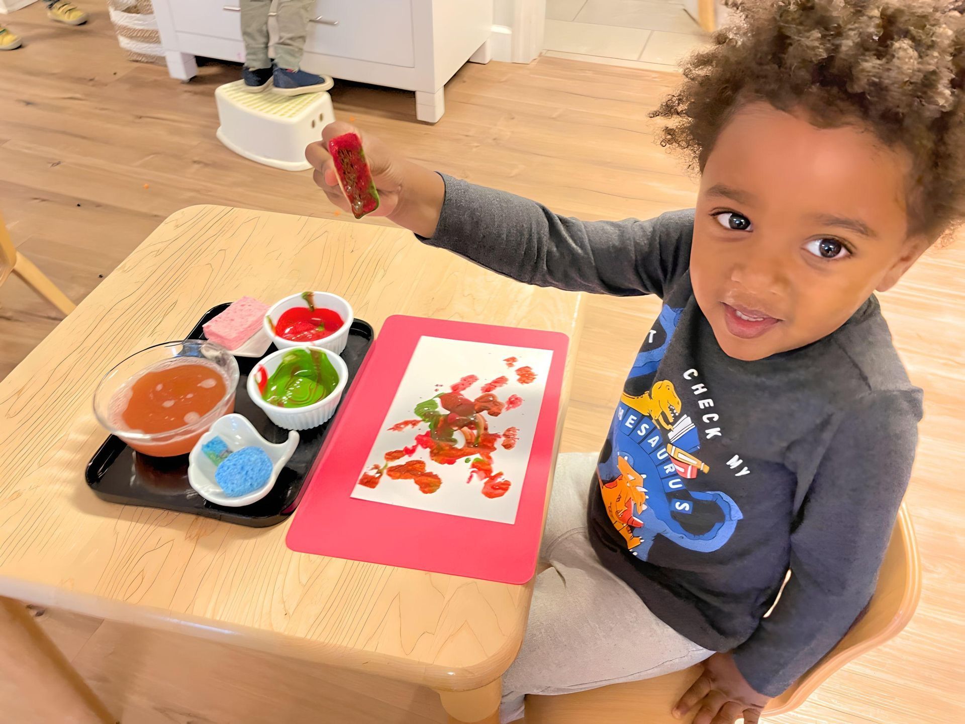 Child practicing painting