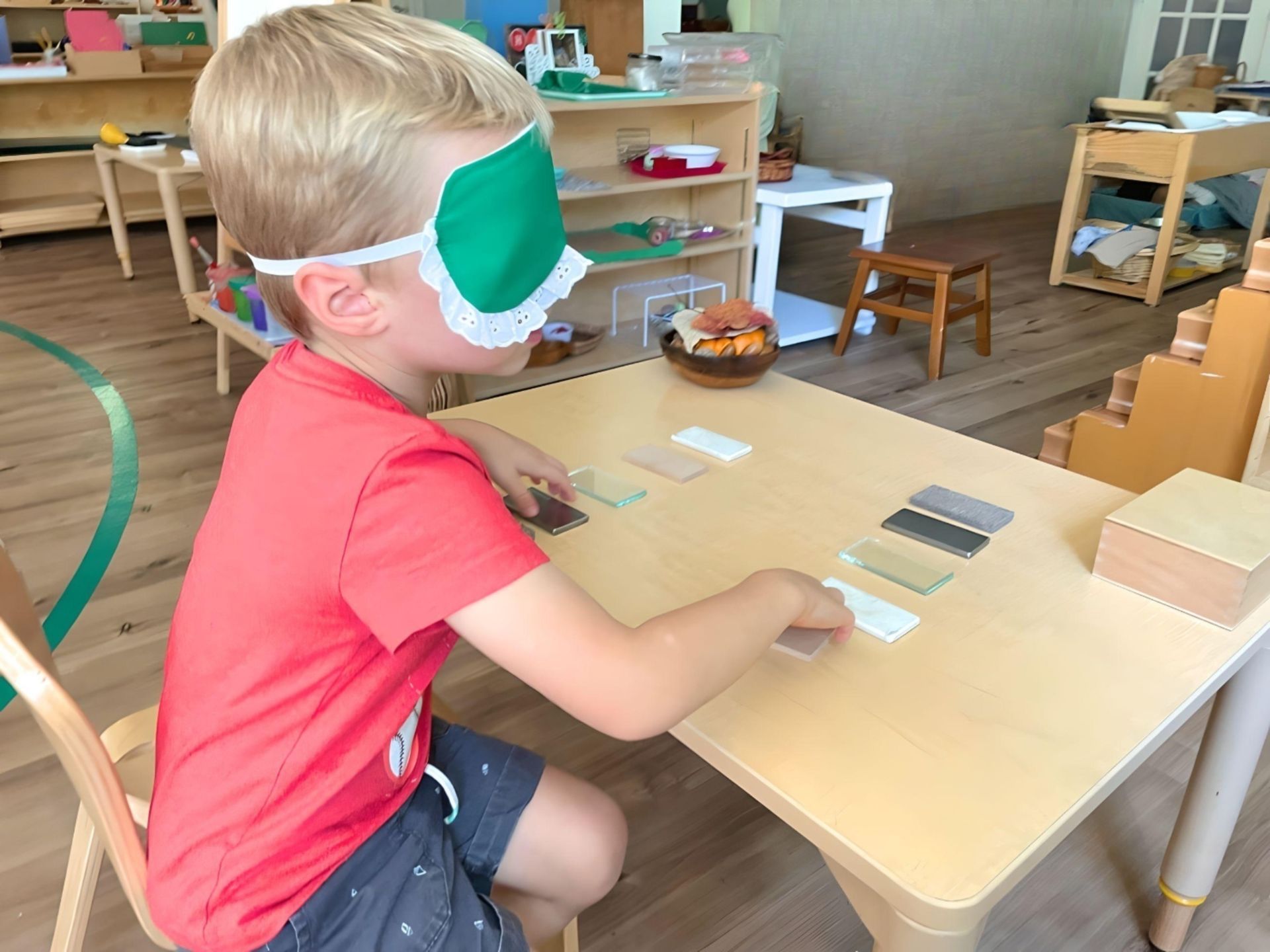 Child working with Montessori Materials