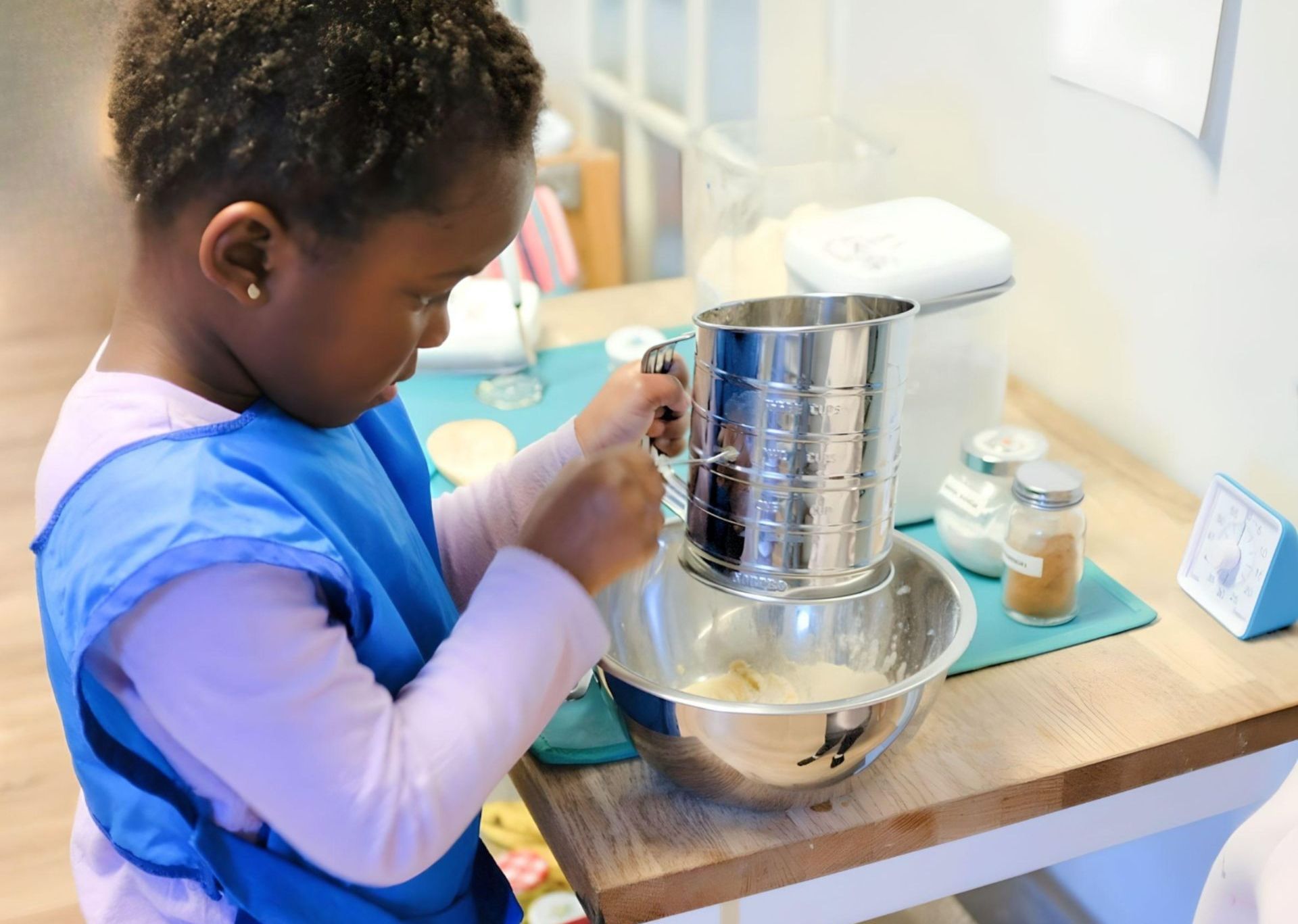 Montessori child working on practical life skills