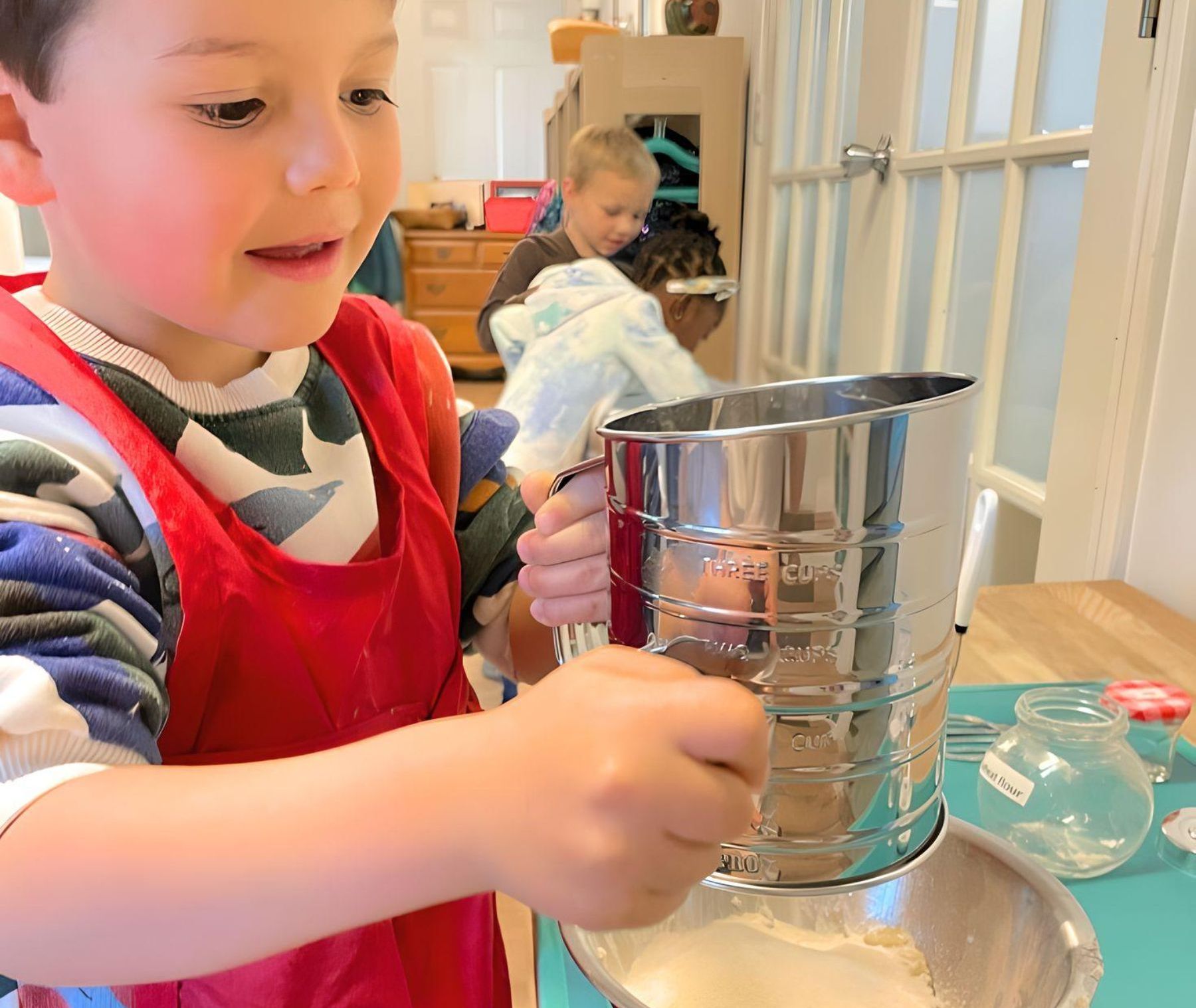 Montessori child working on practical life skills