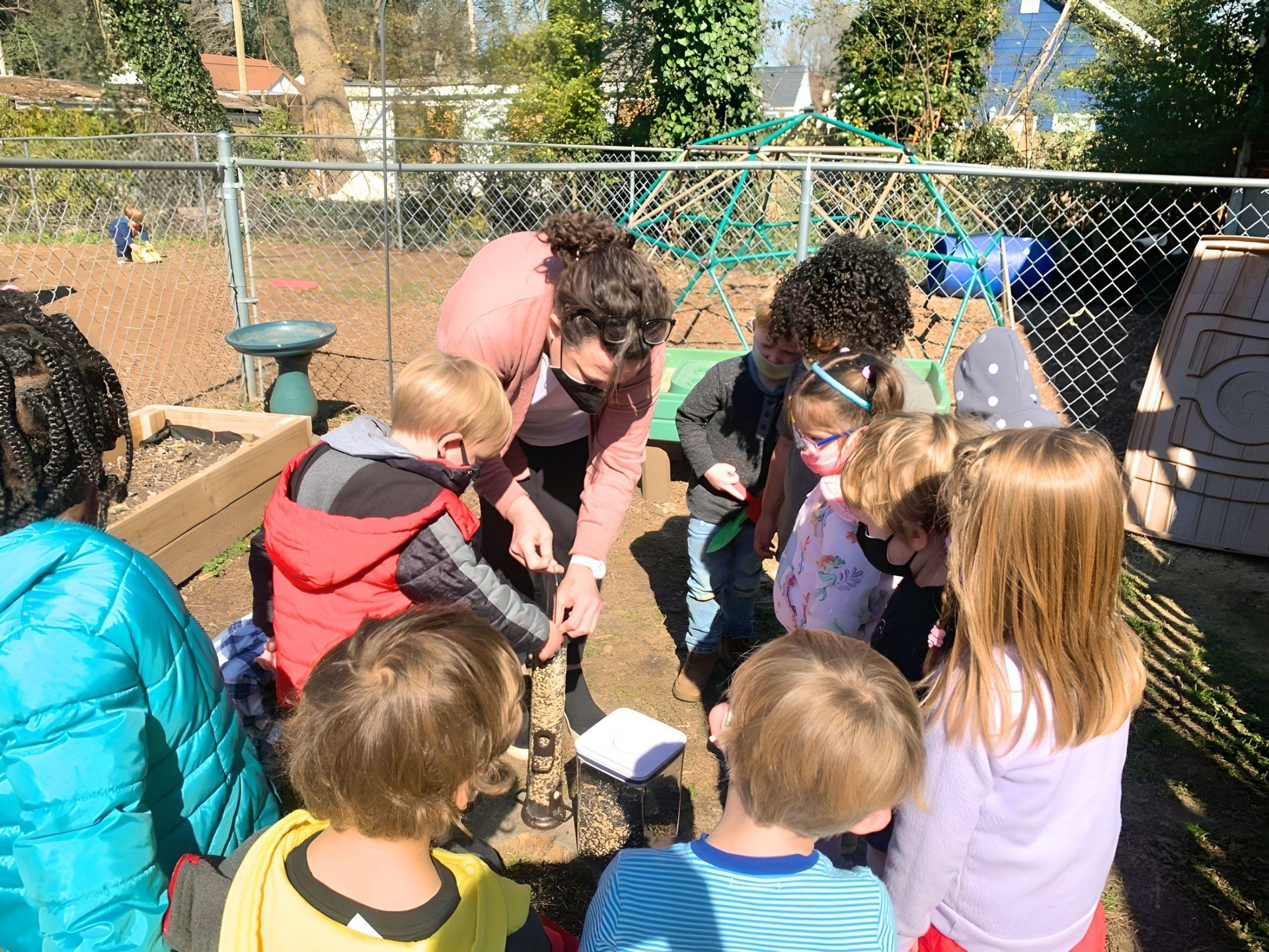Montessori children working outdoors